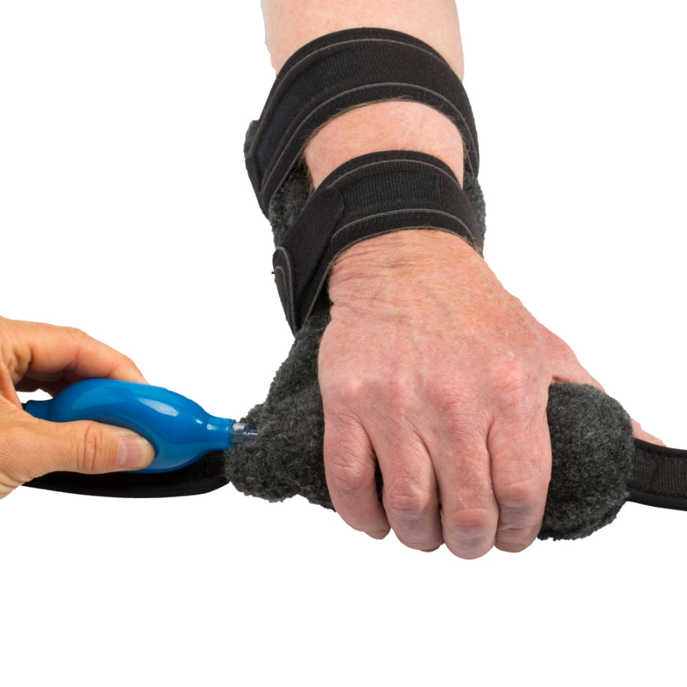 Inflatable hand splint with adjustable rigid frame support